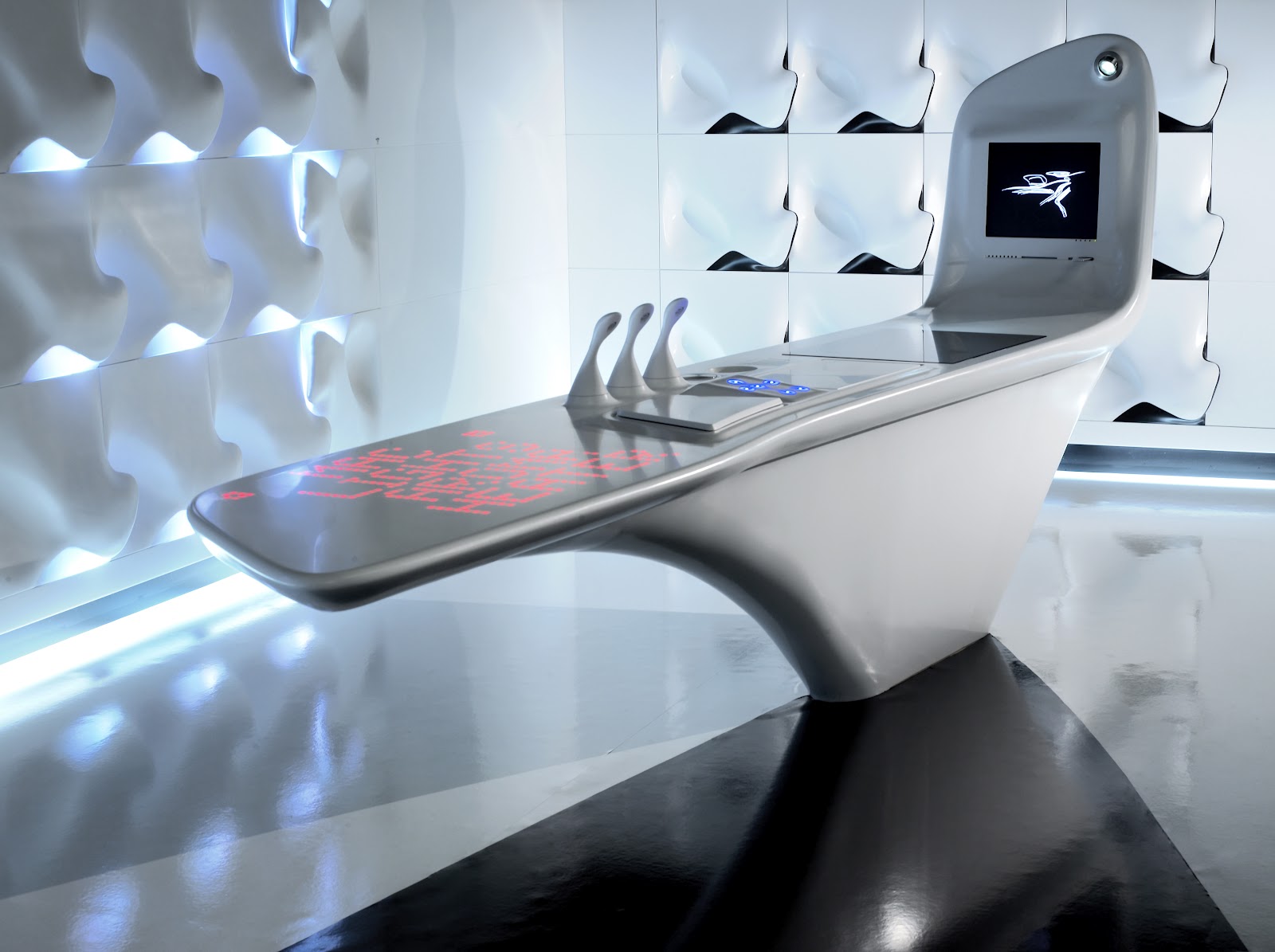 sites/corian.de/IMG/jpg/kitchen-and-wall-cladding-corian-z-island-by-zaha-hadid.jpg